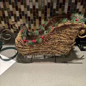 Twig and metal holiday sleigh/sled